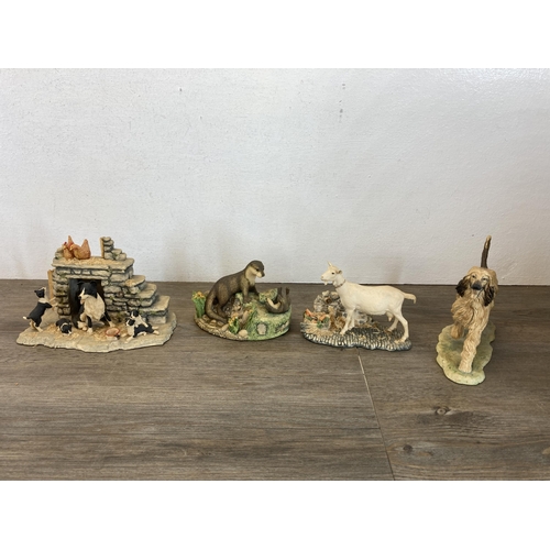 345 - A collection of Border Fine Arts resin animal figurines