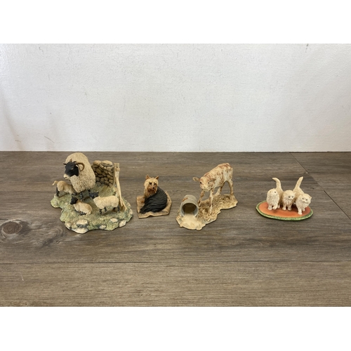 345 - A collection of Border Fine Arts resin animal figurines