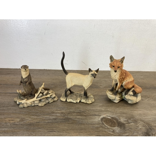 345 - A collection of Border Fine Arts resin animal figurines