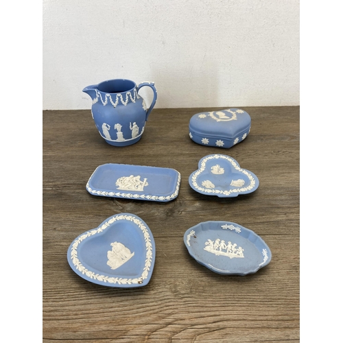 364 - A collection of Wedgwood Jasperware to include pale blue twin handled sugar bowl, black vase, trinke... 