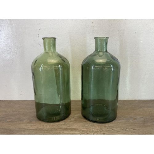 369 - Five pieces of glassware to include Montrose genie bottle - approx. 65cm high etc.