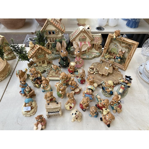 379 - A collection of Pendelfin figurines and display stands to include Event Piece 1994, The Village Pond... 