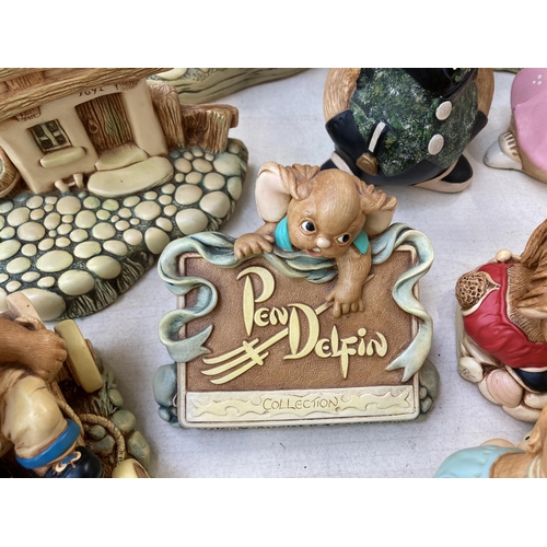 379 - A collection of Pendelfin figurines and display stands to include Event Piece 1994, The Village Pond... 