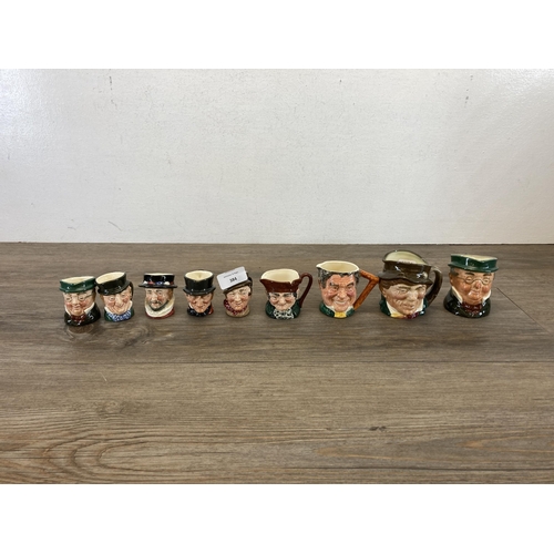 384 - Nine ceramic miniature character jugs, eight Royal Doulton and one Lancaster Sandland