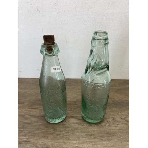 385 - Six antique glass bottles to include Smith's Swinton, Hoe's Sauce etc.