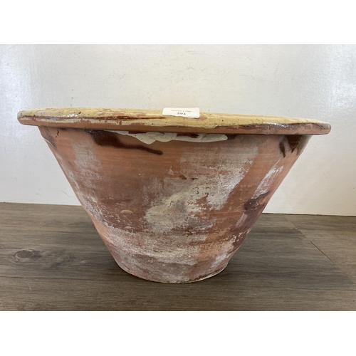 391 - A 19th century salt glazed terracotta dairy bowl - approx. 29cm high x 53cm diameter