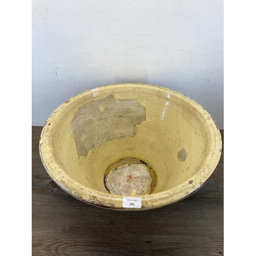 391 - A 19th century salt glazed terracotta dairy bowl - approx. 29cm high x 53cm diameter