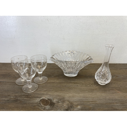 397 - A collection of glassware to include three paperweights, two Caithness vases, two Deco Art Designs v... 