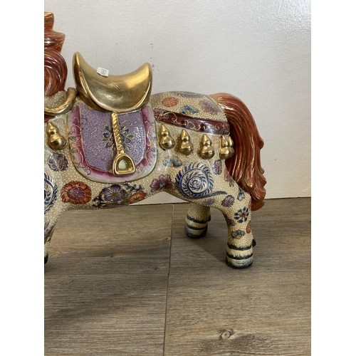 398 - A pair of Oriental porcelain horse figurines - approx. 45cm high