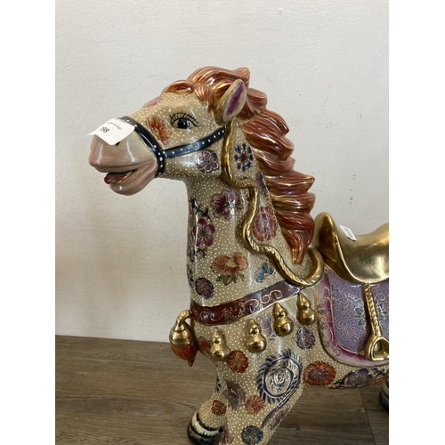 398 - A pair of Oriental porcelain horse figurines - approx. 45cm high