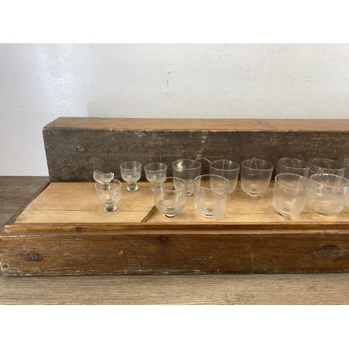 401 - A 19th century pine cased musical glass set - approx. 20cm high x 107cm wide x 20cm deep