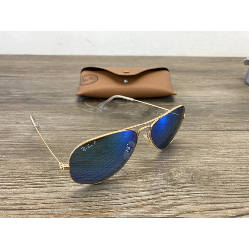 482 - A pair of cased Ray Ban Aviator sunglasses