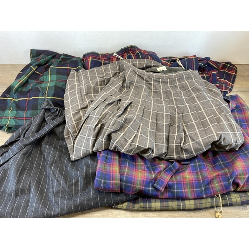 487 - A collection of various Scottish kilts