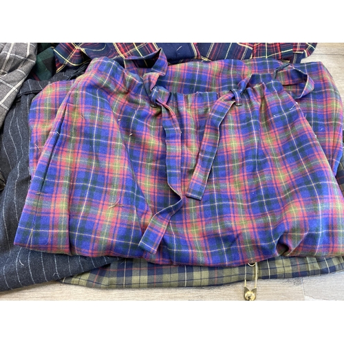 487 - A collection of various Scottish kilts