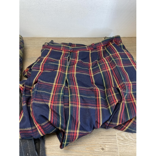 487 - A collection of various Scottish kilts