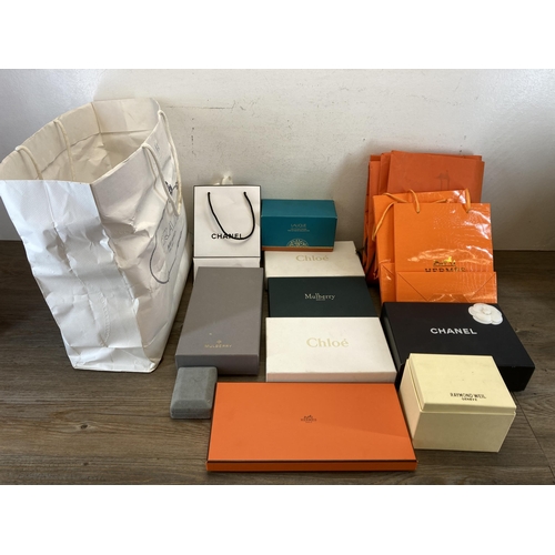 488 - A collection of fashion and jewellery gift boxes to include Mulberry, Chanel, Hermès etc.