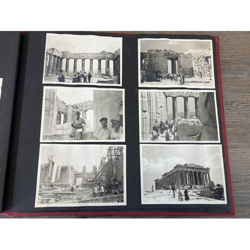 493 - An album containing a collection of mid 20th century black and white travel photographs