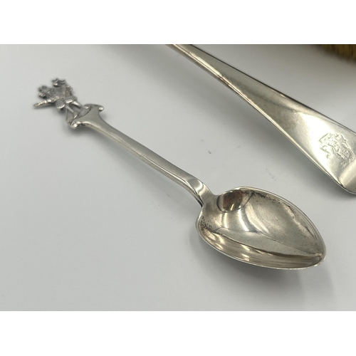 2291 - Five hallmarked sterling silver items, two spoons, two sugar tongs and one brush - approx. gross sil... 