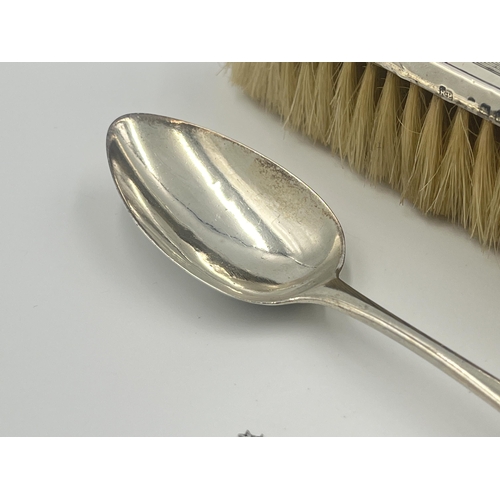 2291 - Five hallmarked sterling silver items, two spoons, two sugar tongs and one brush - approx. gross sil... 