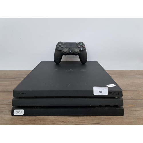 720 - A Sony PlayStation 4 Pro console with DualShock 4 controller