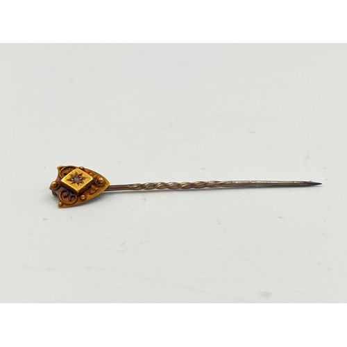 2498A - A late 19th/early 20th century 15ct gold diamond set stick pin - approx. gross weight 1g