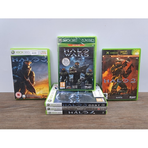 725 - A collection of six Halo games to include signed Halo 2 game, signed Halo 3 game, sealed Halo Wars g... 