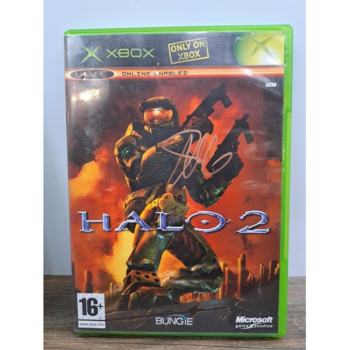 725 - A collection of six Halo games to include signed Halo 2 game, signed Halo 3 game, sealed Halo Wars g... 