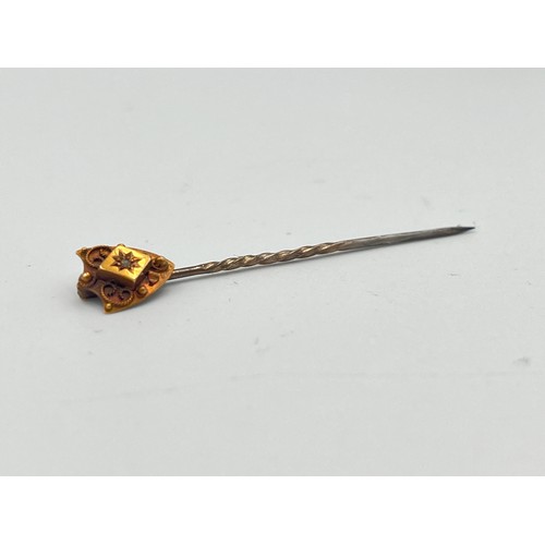 2498A - A late 19th/early 20th century 15ct gold diamond set stick pin - approx. gross weight 1g