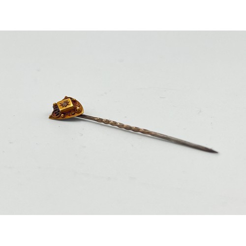 2498A - A late 19th/early 20th century 15ct gold diamond set stick pin - approx. gross weight 1g