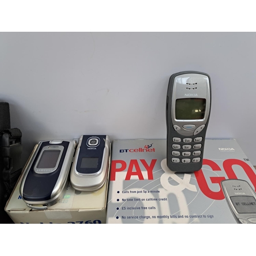 764 - A collection of technology related items to include boxed Nokia 2760 phone, boxed Nokia 3210 phone, ... 