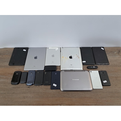 769 - A collection of mobile phones, tablets and accessories to include Apple iPad A1566, Apple iPad A1455... 