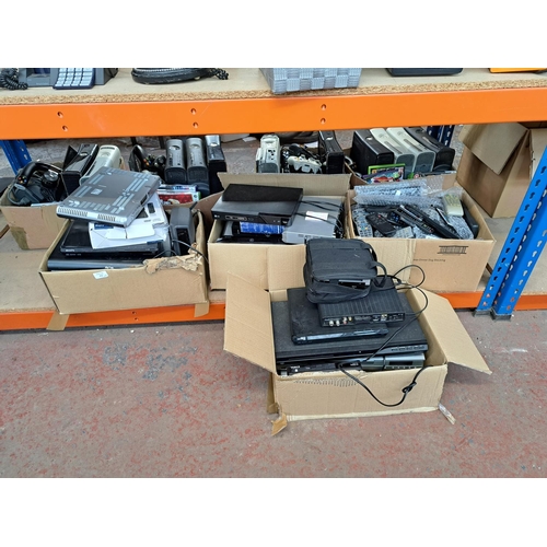 773 - A large collection of AV items to include LG BP240 Blu-Ray player, DVD players, Sky boxes, remotes e... 