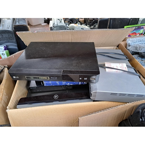 773 - A large collection of AV items to include LG BP240 Blu-Ray player, DVD players, Sky boxes, remotes e... 