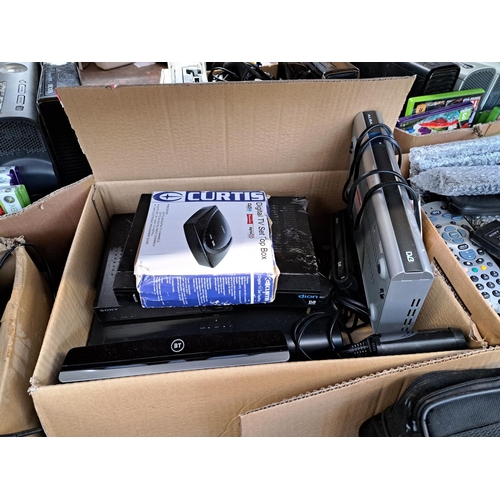 773 - A large collection of AV items to include LG BP240 Blu-Ray player, DVD players, Sky boxes, remotes e... 