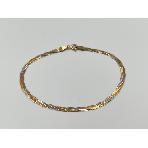 2498D - A hallmarked 9ct tri-colour gold bracelet - approx. gross weight 1.35g