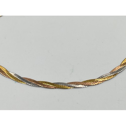 2498D - A hallmarked 9ct tri-colour gold bracelet - approx. gross weight 1.35g