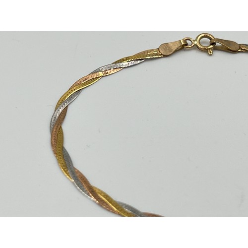 2498D - A hallmarked 9ct tri-colour gold bracelet - approx. gross weight 1.35g