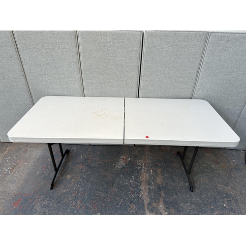 854 - A Lifetime plastic folding trestle table