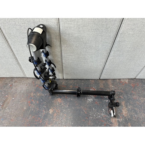 855 - A Thule Apex four bike hitch rack