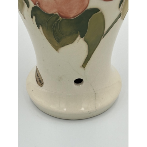 306 - A Moorcroft Coral Hibiscus pattern table lamp - approx. 40cm high