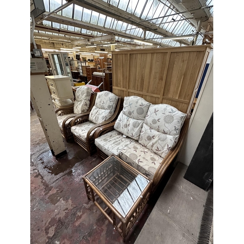 97 - A wicker and cane four piece conservatory suite