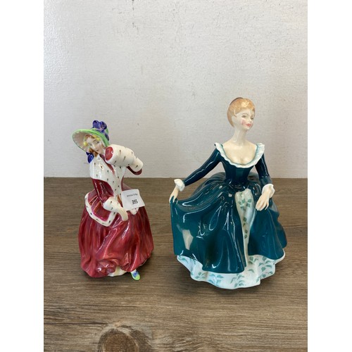 395 - Five Royal Doulton figurines, Christmas Morn HN1992, Janine HN2461, Southern Belle HN2229, Fair Lady... 