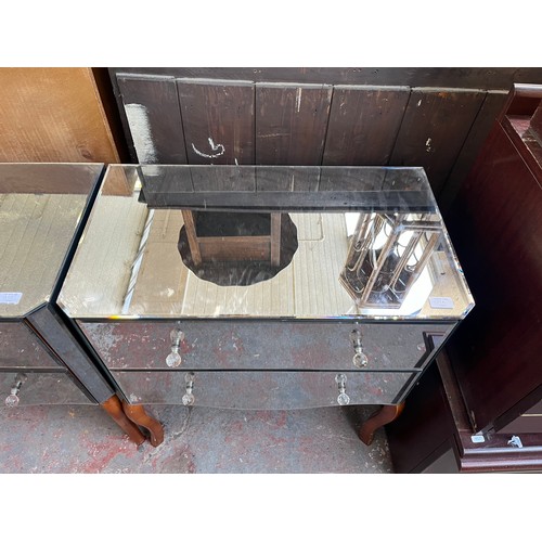137A - A contemporary mirrored glass chest of drawers on wooden cabriole supports - approx. 77cm high x 70c... 