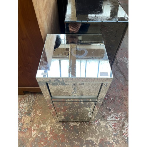 137C - A contemporary mirrored glass bedside cabinet - approx. 69cm high x 35cm wide x 35cm deep