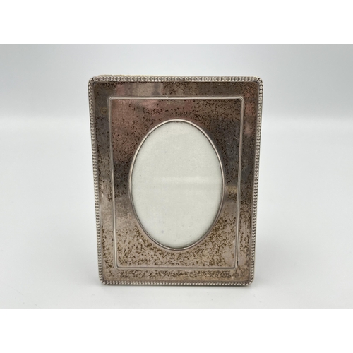 2293 - A hallmarked London .925 silver photo frame, dated 1991 - approx. 10cm high x 8cm wide