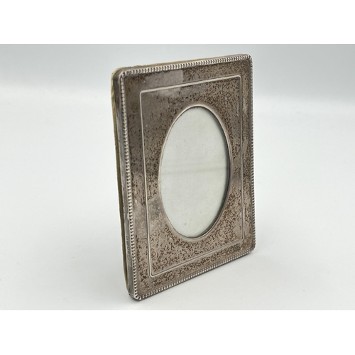 2293 - A hallmarked London .925 silver photo frame, dated 1991 - approx. 10cm high x 8cm wide