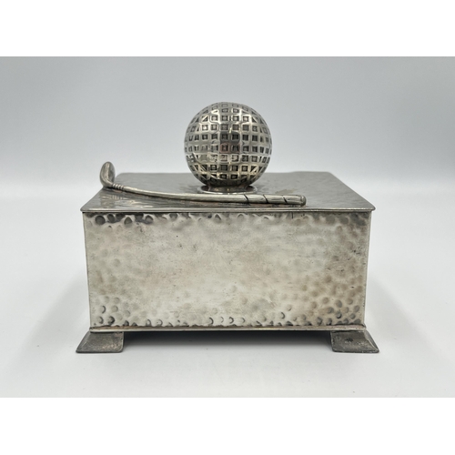 2294 - An early 20th century Civic Pewter No. 1640 hammered pewter novelty golf club and ball cigarette box... 