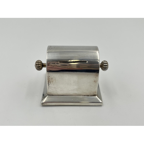 2299 - An Edwardian Charles & George Asprey hallmarked London silver stamp roll dispenser, dated 1903