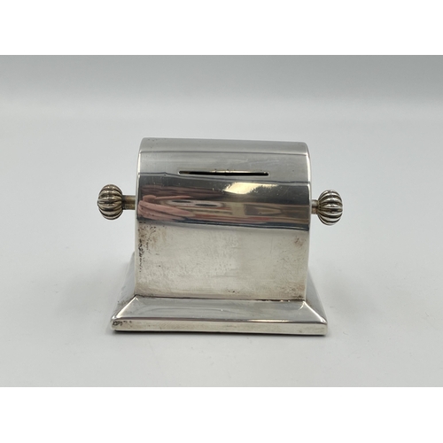 2299 - An Edwardian Charles & George Asprey hallmarked London silver stamp roll dispenser, dated 1903