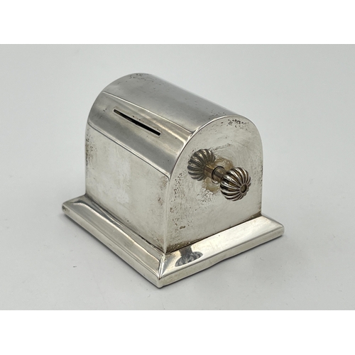 2299 - An Edwardian Charles & George Asprey hallmarked London silver stamp roll dispenser, dated 1903